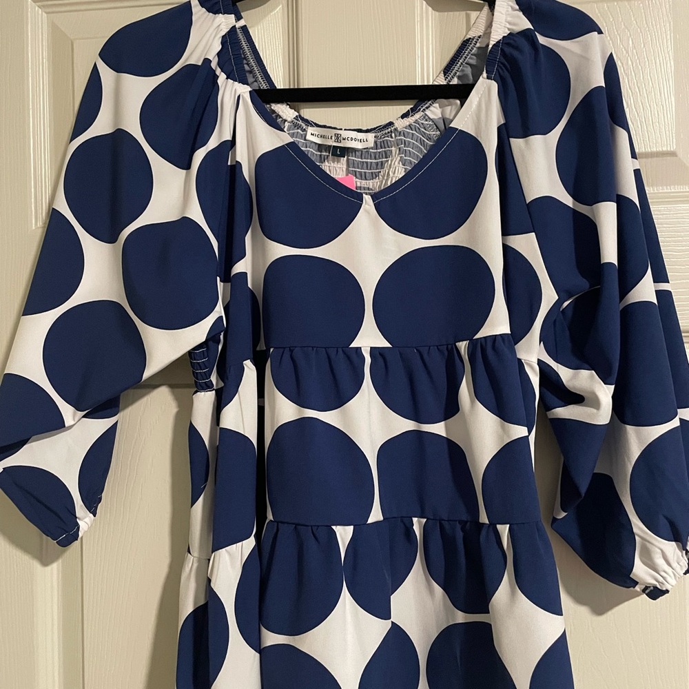 Michelle McDowell sophia Top.smocked neckline and puff elbow-sleeve…